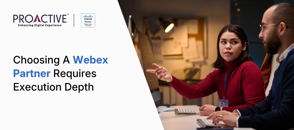 business team in discussion in front of a screen 